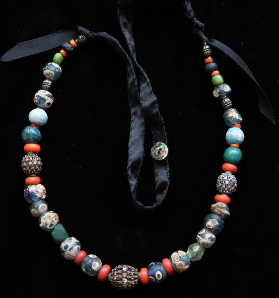 A necklace with ancient eye beads