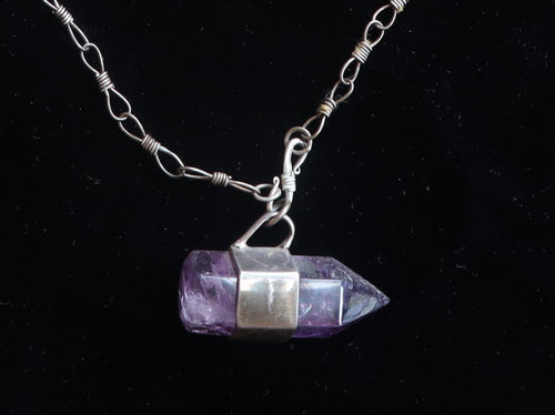 32 Natural amethyst crystal on a silver chain