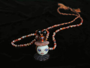 114 Face bead and carnelian necklace