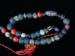 35 A strand of old and ancient beads.