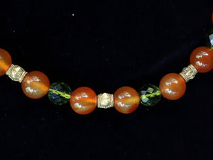 39 Carnelian, green crystal and Balinese gold necklace.