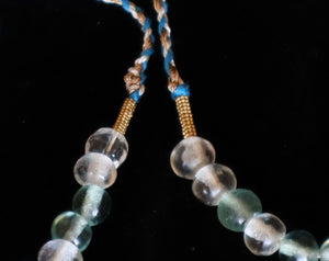 44 Rock crystal and gold beads